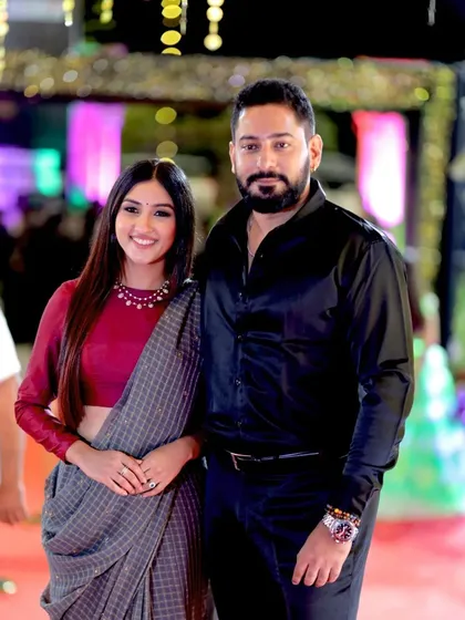 A great shot of celebrity couple Prajwal Devaraj and Ragini Prajwal posing together on the red carpet.