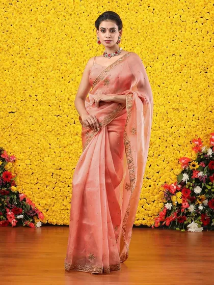 The sheer quality of the organza fabric is beautifully highlighted in this shot.