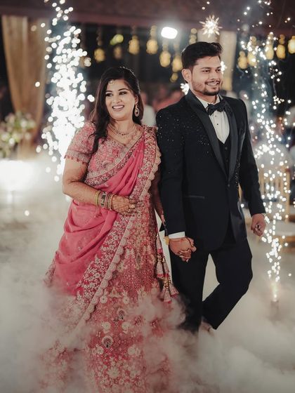 The grand entrance for the happy couple, Bhumi and Avi. We used cold pyro and smoke effects to create a dramatic and unforgettable moment as they walked into their reception.