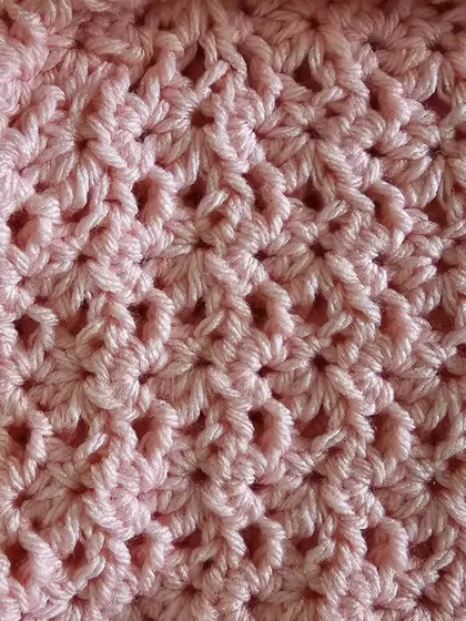 A close-up of the beautiful, textured stitch work used for the body of the Avery Top.