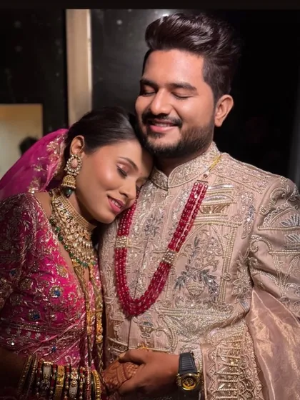 A heartwarming, candid moment between a bride and groom on their special day.