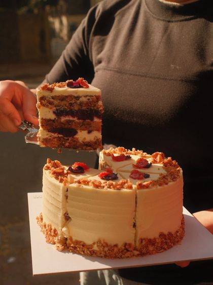 Serving up a slice of our moist and delicious Dilli Carrot Cake.