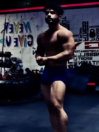 Stay focused, stay dedicated. Posing in front of the "Never Give Up" sign, a motto I live by.