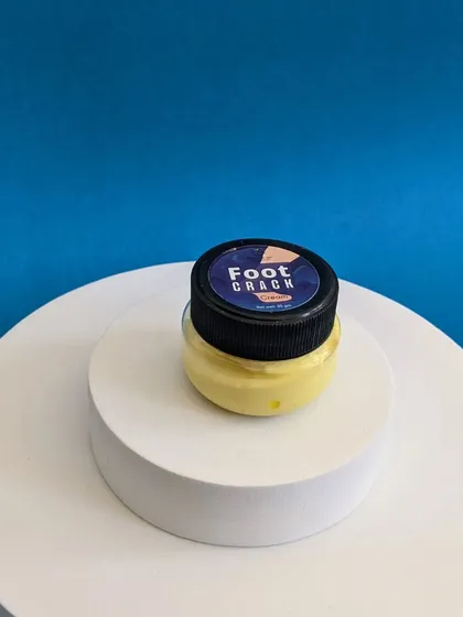 A product shot of my Foot Crack Cream. This little jar contains a powerful, non-greasy formula to provide deep hydration and heal cracked heels fast.