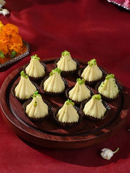 My in-house mithai atelier presents these exquisite kesar pista modaks for Ganesh Chaturthi. Each bite is a harmonious blend of tradition and artistry.