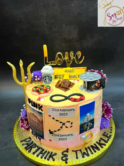 This cake is a map of a couple's love story. It features edible photos of their special places, important dates, and inside jokes, from their hometown to the Taj Mahal, creating a truly unique anniversary cake.