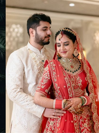 A beautiful portrait of the couple, with the groom's arm gently around his bride. Their coordinated outfits and serene expressions are perfectly captured.