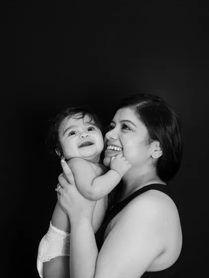 In this black and white portrait, you can see the love, trust, and pure joy that exists between a mother and her child. It’s a simple, powerful image that celebrates the beauty of motherhood.