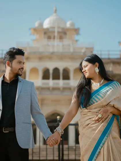 A sweet hand-in-hand moment in front of Albert Hall. This simple, classic pose is always effective at showing the connection and bond between a couple.