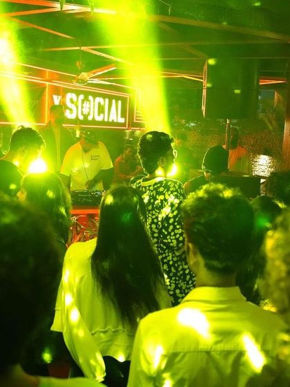 The crowd dancing and enjoying the music at our Social Sunday Sundowner event.