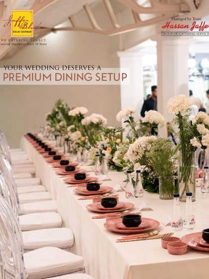Your wedding deserves a premium dining setup, and we deliver just that. This long shot of a beautifully decorated table with fresh white flowers and elegant ghost chairs highlights our commitment to creating a sophisticated atmosphere.