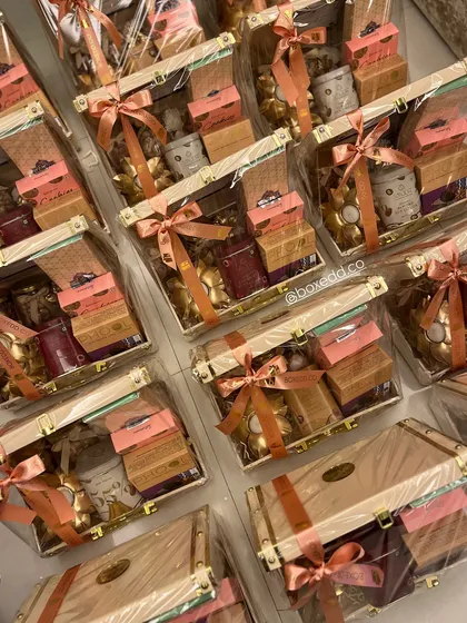 A sea of our luxury wooden trunk hampers from a previous Diwali season, packed and ready to delight. This shows our experience in handling large, simultaneous orders for corporate clients.