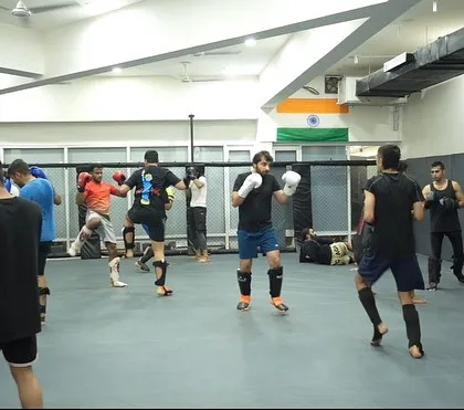 A wide view of our striking class shows students of all levels working together. The energy in the room is always high as everyone grinds to improve.