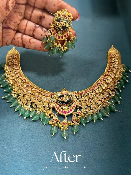 The "After" shot of a stunning transformation. We took a simple gold necklace and added intricate work and beautiful green bead drops to create this grand, wedding-ready piece with matching earrings.