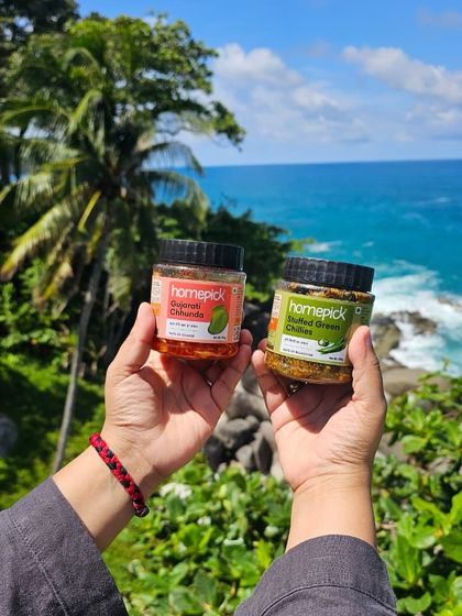 Holding onto the taste of home, no matter where we are. Our Gujarati Chhunda and Stuffed Green Chillies are the perfect travel buddies for any adventure.