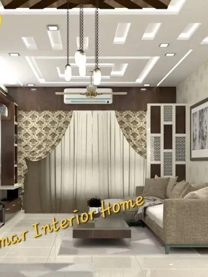 A view of the living room from the dining area, showing a cohesive design language. The patterned curtains and jali partition add decorative elements to the space.