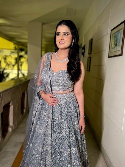 A beautiful half-up, half-down style with soft waves for an elegant engagement look.