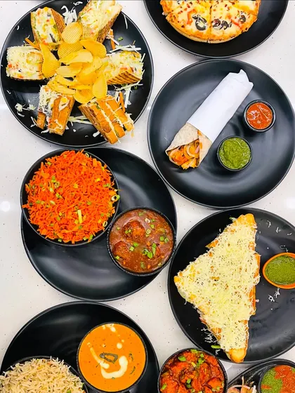 A food coma is guaranteed with this spread of my most popular dishes, including rice, sandwiches, pizza, and rolls.