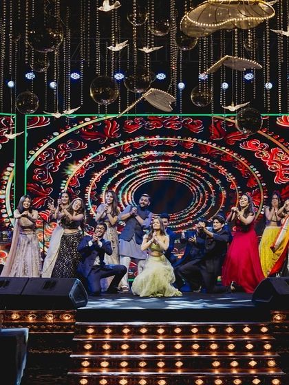 The grand finale of the friends' performance, with everyone on stage for a memorable picture.