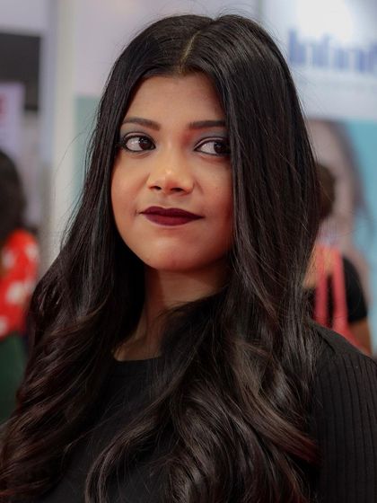 Another angle of the haircut, highlighting the texture and movement created by our expert stylists.