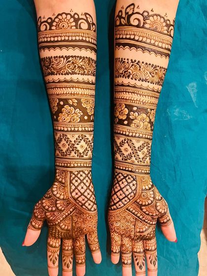 A classic bridal look with bands of different patterns. This style features alternating floral, geometric, and traditional motifs for a rich and varied texture.