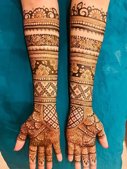 A classic bridal look with bands of different patterns. This style features alternating floral, geometric, and traditional motifs for a rich and varied texture.