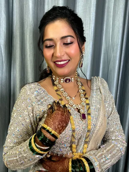 A close-up of the reception makeup, with shimmering eyeshadow and a perfectly blended base.