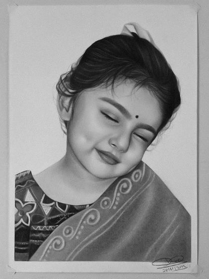 Another portrait of a cute baby girl, this time in a traditional saree. Capturing the peaceful expression and dimples was the focus of this piece.
