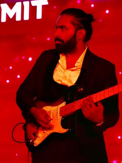 Our guitarist delivering a powerful solo during the EliteCISOs corporate event.