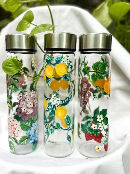 My mom painted these beautiful Borosil water bottles with incredible detail. Featuring lemons, mixed fruits, and her favorite hydrangeas, these are a true work of art for your kitchen.