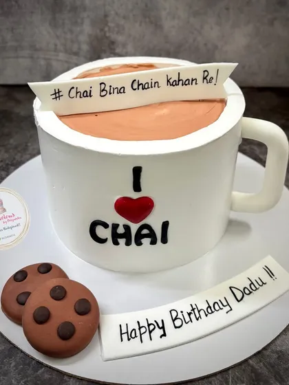 A fun, custom cake I made for a chai lover's birthday. This is a 100% eggless cake sculpted to look like a mug of tea, complete with fondant cookies. It shows how I can turn your unique ideas into a delicious reality for any celebration.