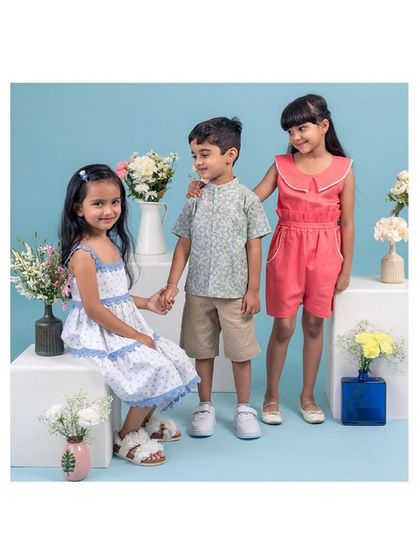 A group shot from a kids' clothing brand photoshoot, showing the sweet and natural interactions between the children. My sessions are designed to be playful, which helps in capturing authentic moments even during a commercial shoot.