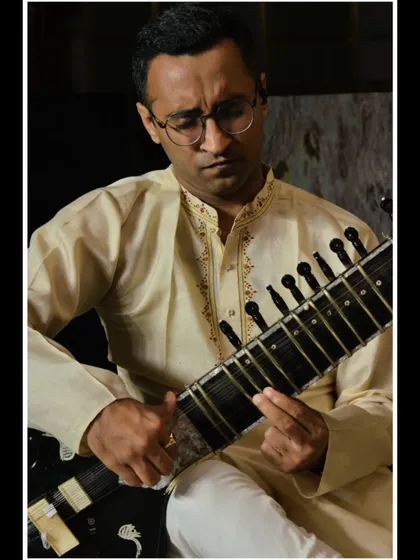 A focused portrait from a live show.