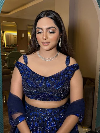 A close-up of this beautiful soft glam makeup. The eyes are shimmery and defined, and the skin is flawless.