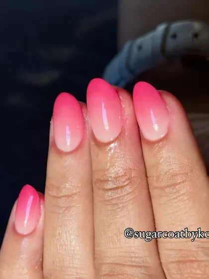 A vibrant pink ombré, like a sunset on your fingertips. The gradient is blended seamlessly for a flawless finish.