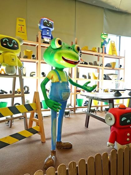A group of Gecko's Garage character statues, including Gecko himself and the colourful Mechanicals, creating a perfect scene for photos.