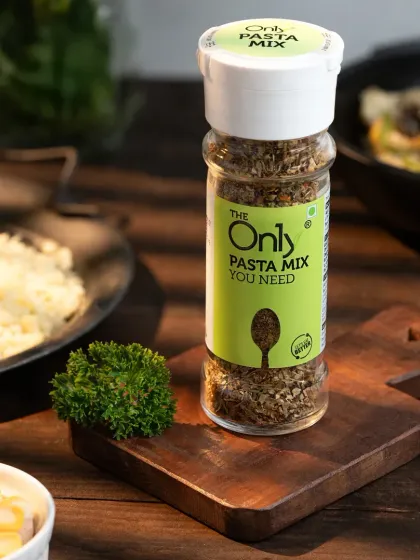 A pasta mix seasoning jar photographed in a cozy, rustic kitchen scene. We create detailed sets in our studio to place products in their natural environment.