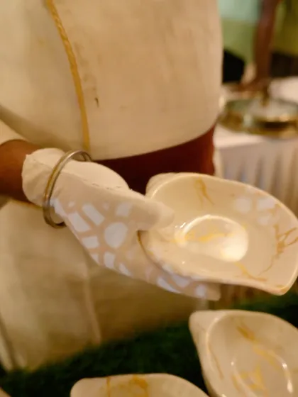 An empty serving dish, ready to be filled with a culinary creation. Our team ensures every piece of crockery is pristine, setting the stage for a perfect food presentation.