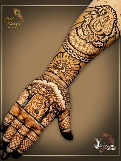 The other hand from the asymmetrical set, featuring an elephant portrait, a peacock, and a large paisley design.