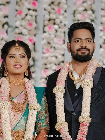Another lovely shot of our bride on her wedding stage. The soft-focus makeup and traditional attire create a picture-perfect memory.