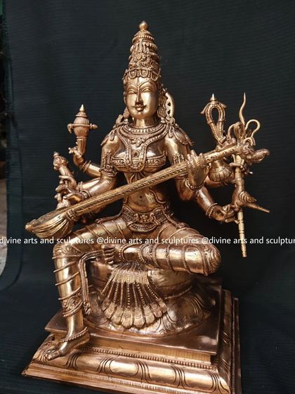 Another view of the Matangi statue, showing the intricate details of the veena and her expressive posture.