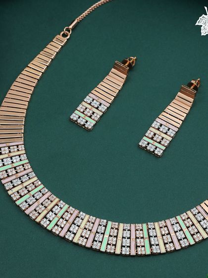 The full Fusion Rose Gold necklace and earring set, a testament to contemporary craftsmanship.