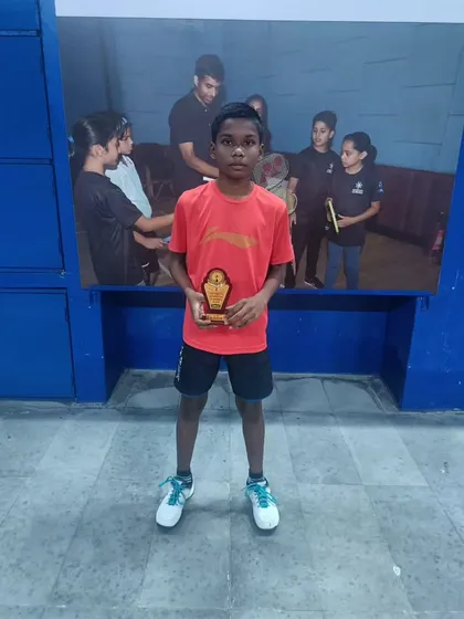 Aditya Dasari, our student from Aatmann Yoga & Sports, after securing the U-15 Boys singles runner-up title at the Solapur District Tournament.