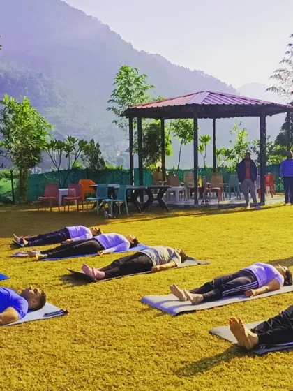 There is profound healing in stillness. This is a moment of complete relaxation in Savasana during one of my yoga retreats in Rishikesh. Practicing outdoors, surrounded by nature, allows for a deeper connection to the self and a true release of mental and physical stress.