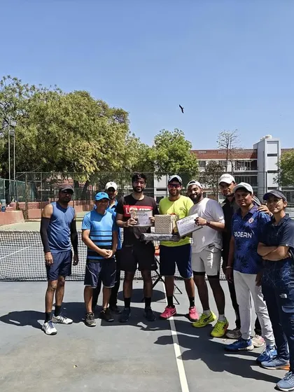 A group of men's doubles players after their final match at the Ad In Tennis Open. The level of play was exceptional throughout the event.