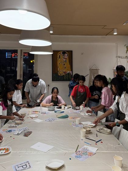 A mosaic art birthday party in session. This activity is fantastic for older kids and teens, allowing them to focus on creating intricate designs while chatting with their friends.
