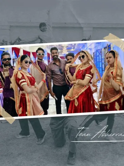 Our talented dance troupe in their vibrant red and gold costumes, ready to bring energy and elegance to a wedding performance.