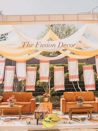 I love weaving cultural stories into my decor. This Haldi ceremony seating area is a tribute to Assamese heritage, featuring traditional Gamcha drapes against a clean, modern structure. It’s a beautiful fusion of tradition and contemporary style.