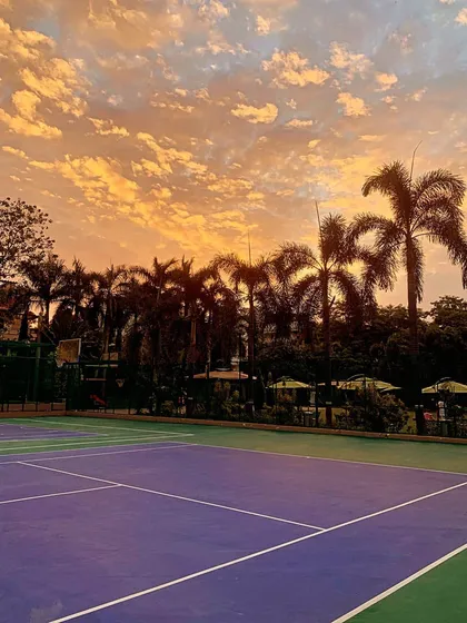 There's nothing quite like playing tennis as the sun sets. Our courts provide the perfect setting to focus on your game and enjoy the sport. We believe a great training environment inspires great performance, whether it's on our hard courts or clay surfaces.