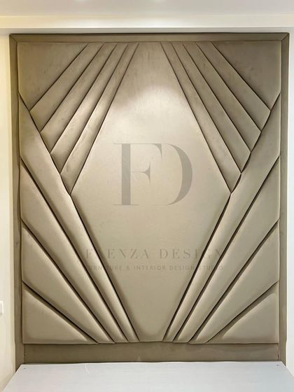 A bed with a magnificent, full-height headboard featuring an Art Deco-inspired, fan-like tufted pattern. This piece is designed to be the undeniable artistic centerpiece of a master bedroom.